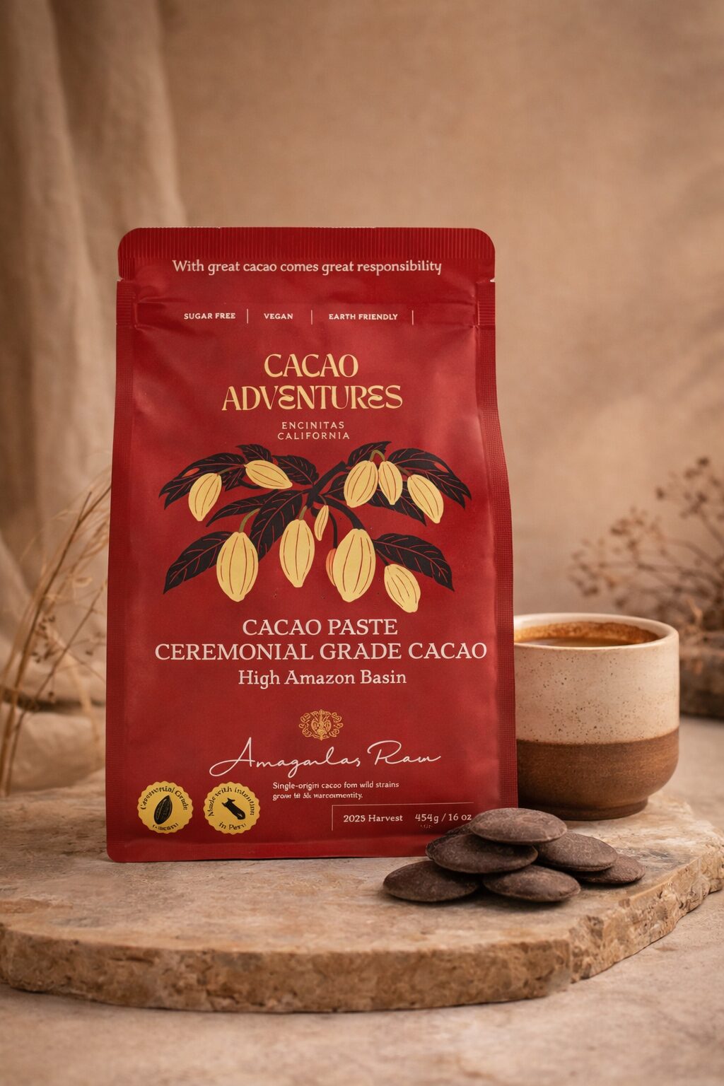 Ceremonial grade cacao pouch from the High Amazon Basin styled with cacao discs and a warm ceramic cup on a neutral earthy background